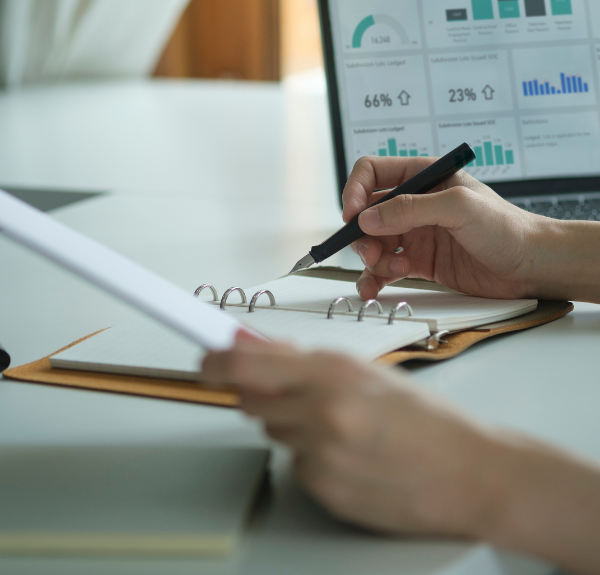 A person examines financial documents.